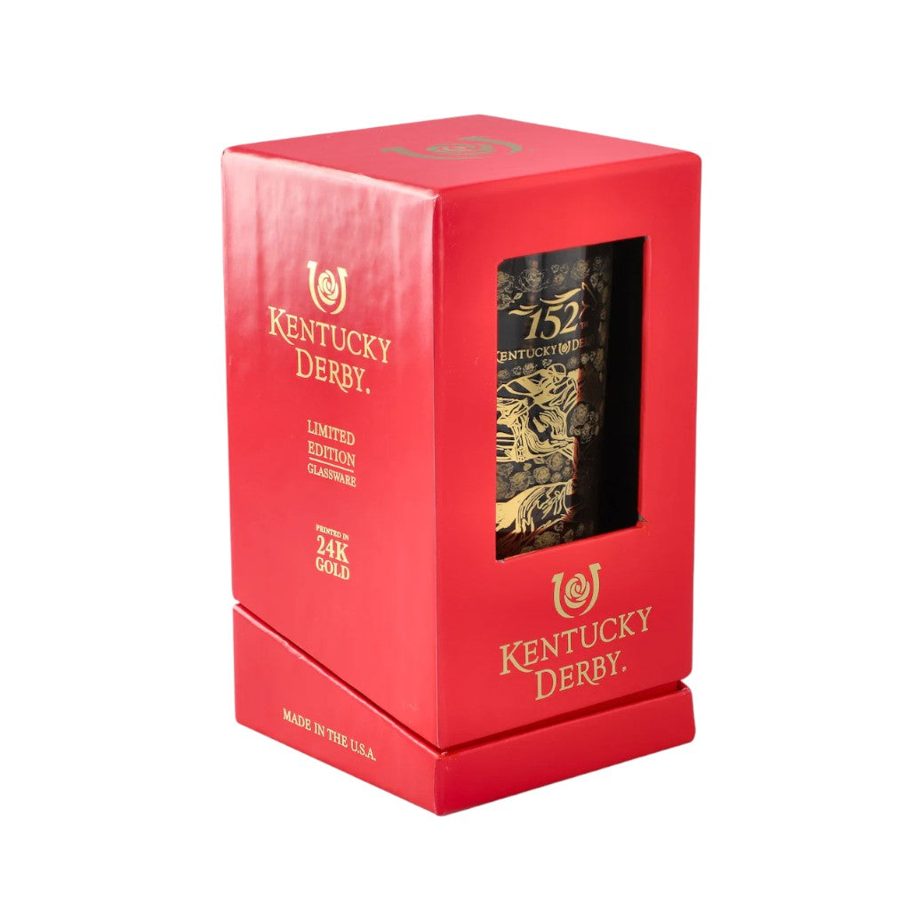 The limited edition gold julep glass shown next to its official packaging, perfect for gifting.