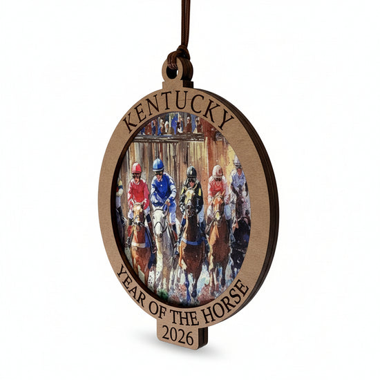 Decorative ornament with horse racing scene and 'Kentucky Year of the Horse 2026' text on a white background