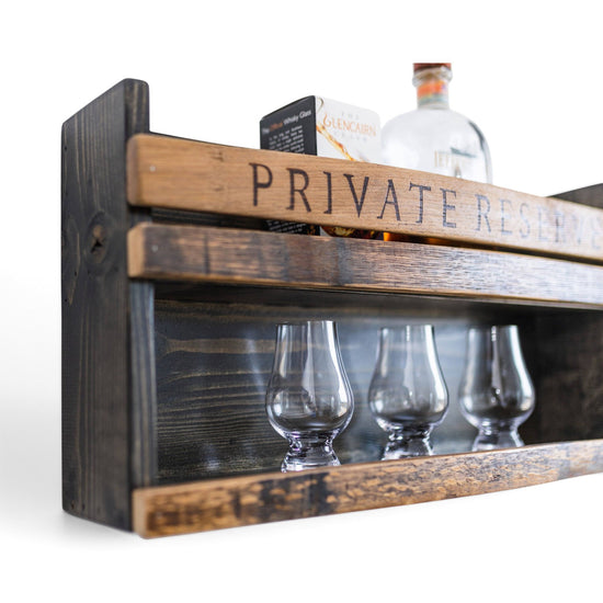 Detail of the stained solid pine construction paired with barrel staves on the Luxe Bar Shelf Private Reserve.