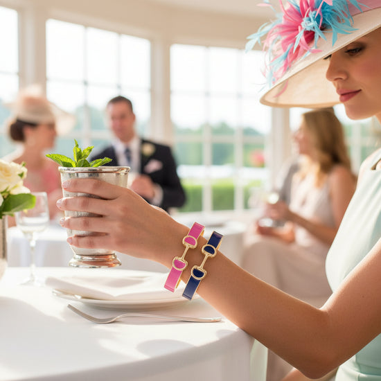 A model wearing a stack of Majesty Horsebit Enamel Bangles on her wrist.