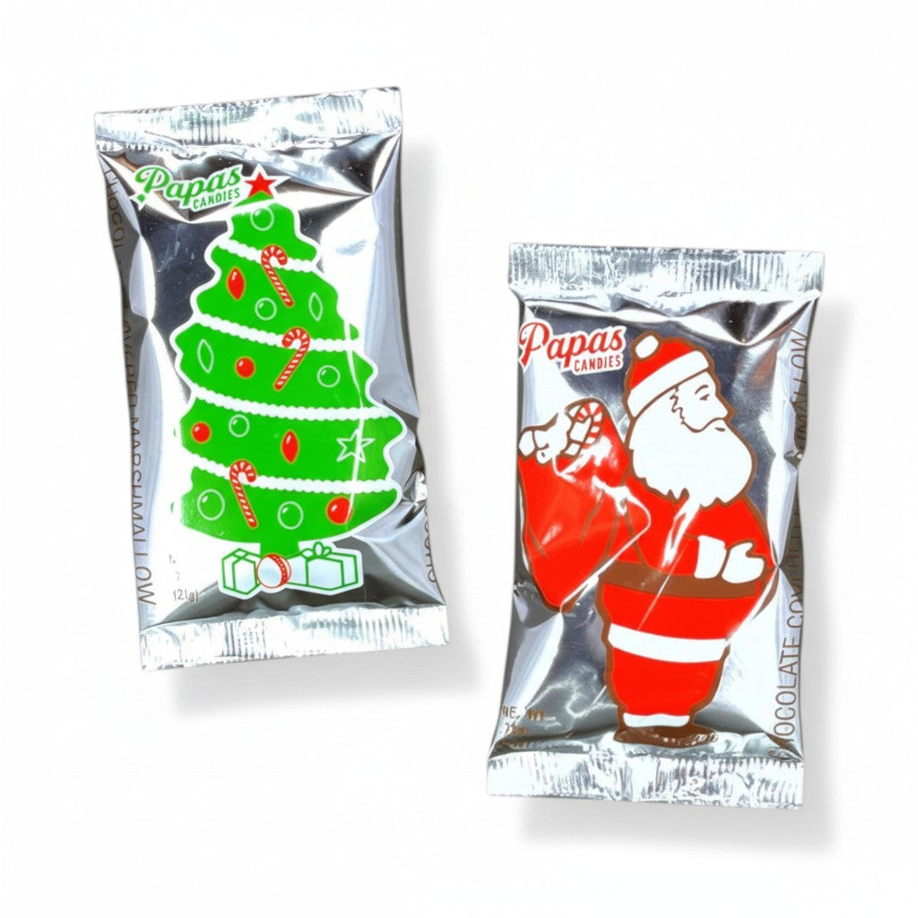 A cheerful pair of marshmallow treats: one shaped like Santa Claus and one like a Christmas Tree.