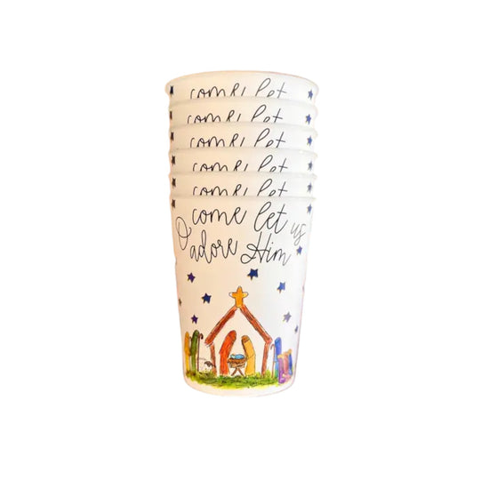 A blue and white reusable cup featuring a Nativity scene and starry night design.