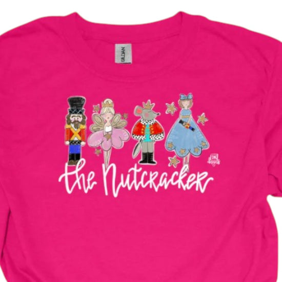 A close-up of the whimsical illustration of the Nutcracker, Sugar Plum Fairy, and other characters.