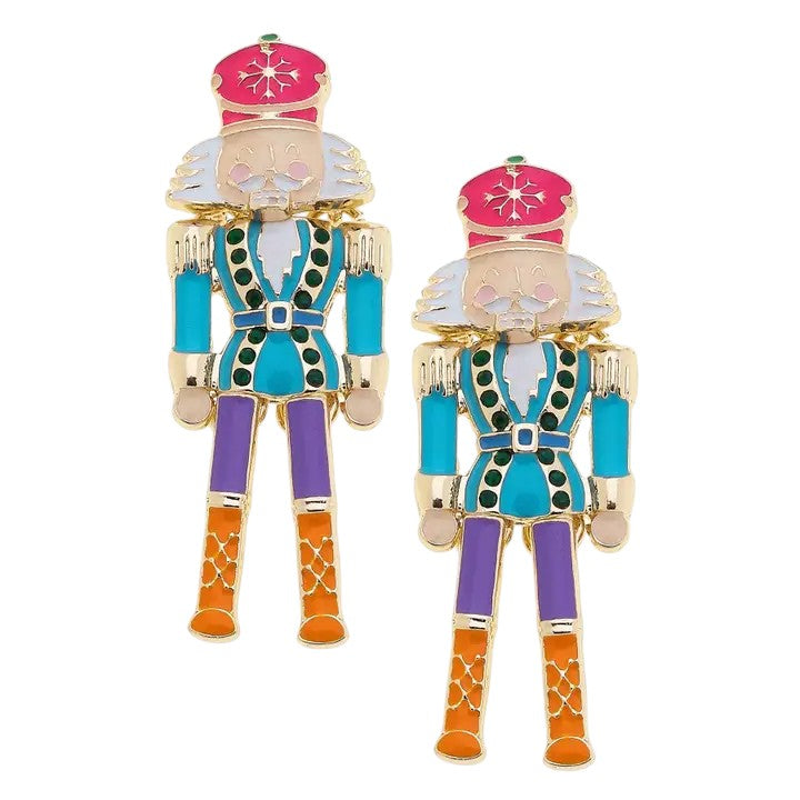 A pair of colorful 18K gold-plated nutcracker soldier earrings on a white background.
