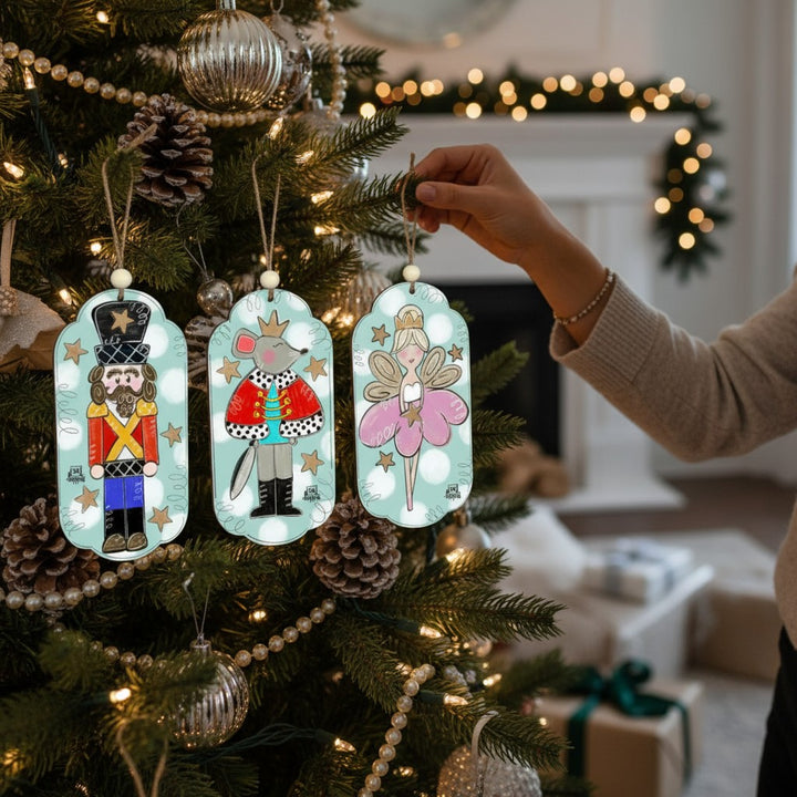 A festive Christmas tree decorated with the full set of Nutcracker ballet ornaments