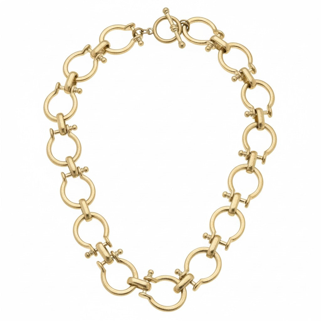 A close-up view of the classic and secure gold-tone toggle clasp.