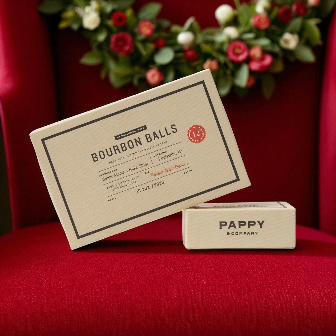 Box of Bourbon Balls with Pappy & Company branding on a red background