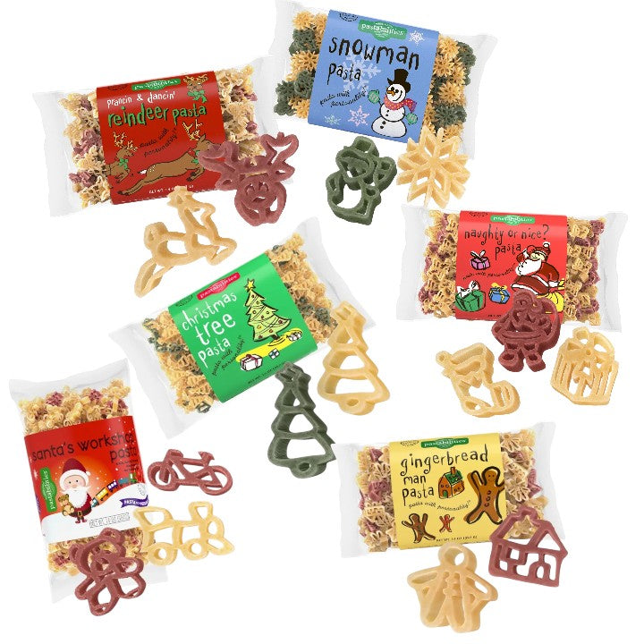 Assorted Christmas-themed pasta packages with decorative shapes on a white background