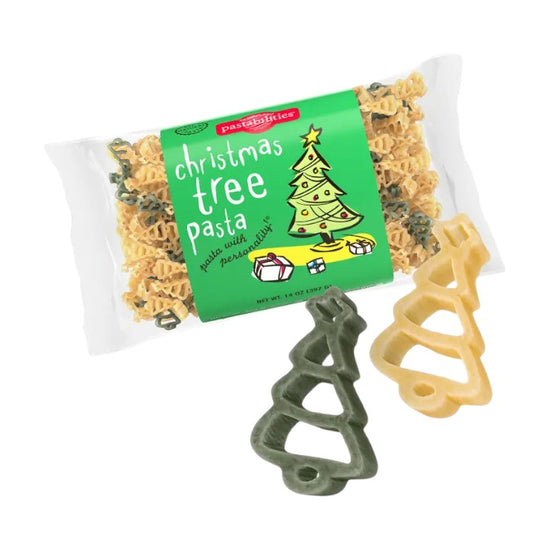 Packaged Christmas tree pasta with two tree-shaped pasta pieces on a white background