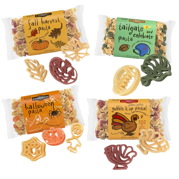 Four packages of pasta with themed labels on a white background