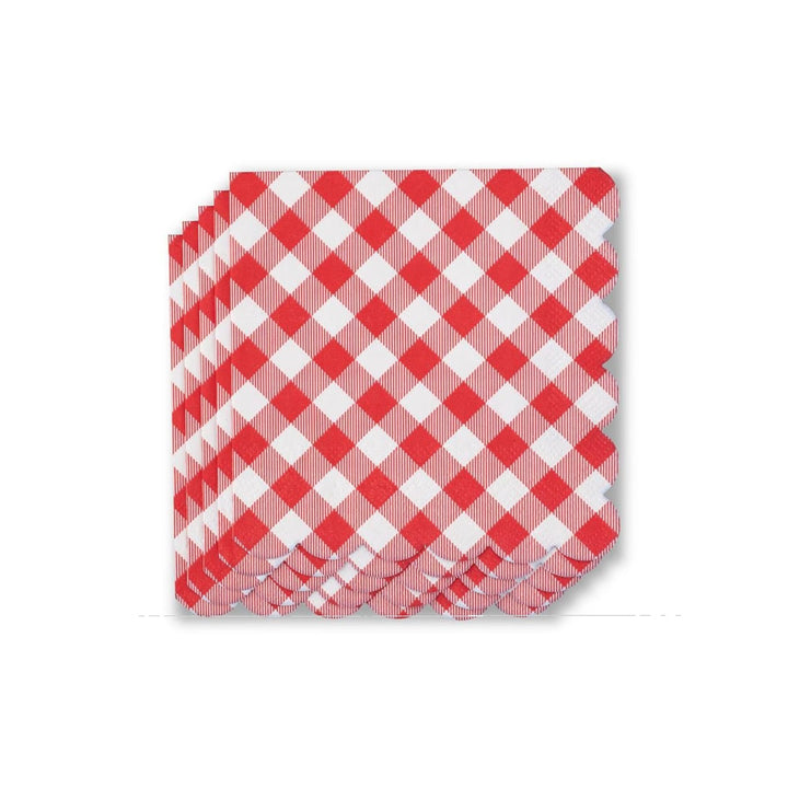 A staggered, diagonal stack of red-and-white gingham cocktail napkins fanned out against a clean white background, highlighting their decorative scalloped edges.