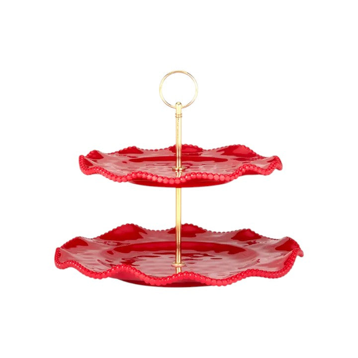 Red two-tiered stand with gold central pole on a white background