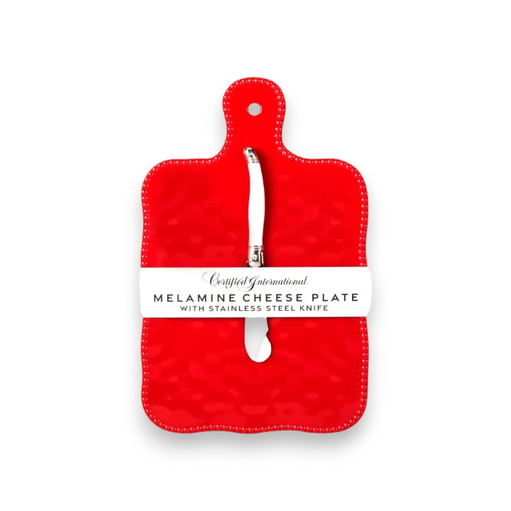 Red melamine cheese plate with a knife on a white background