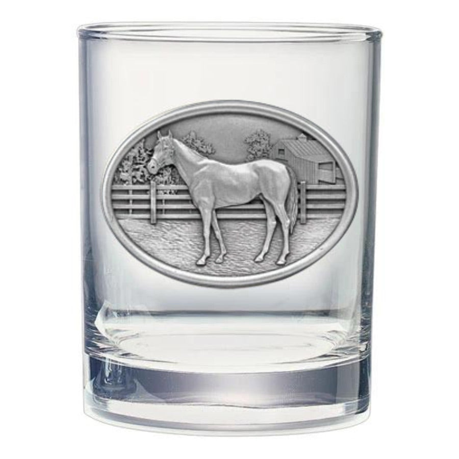 Clear glass tumbler with a horse emblem on a white background