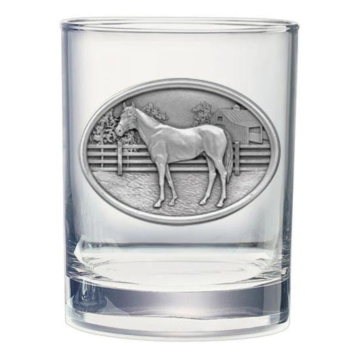 Clear glass tumbler with a horse emblem on a white background