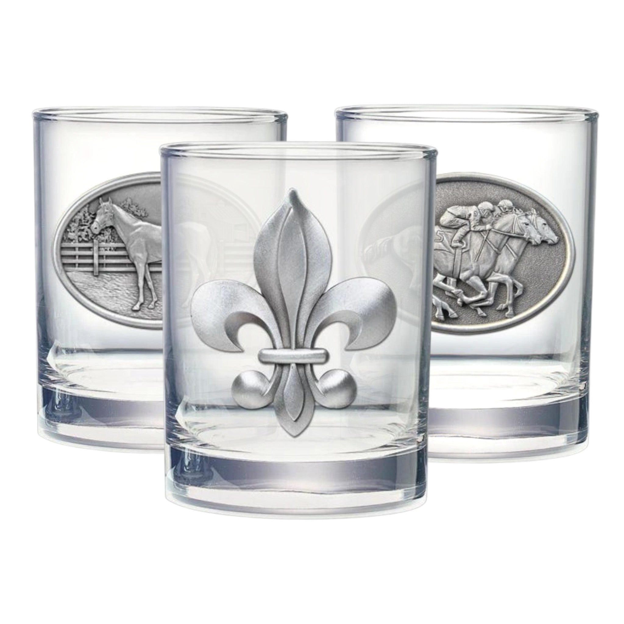 Three clear glasses with silver fleur-de-lis designs on a white background