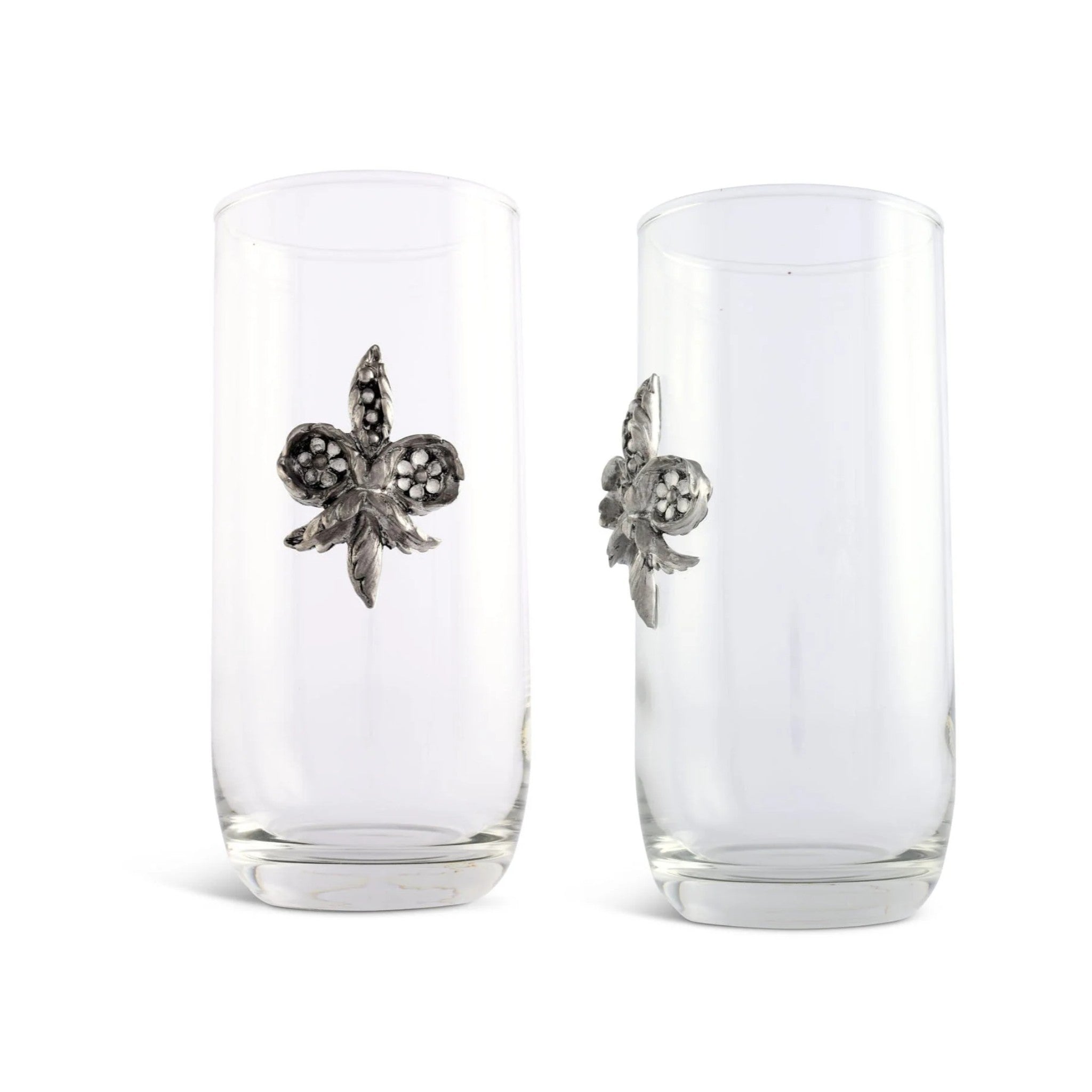 A close-up shot of the hand-crafted pewter Fleur De Lis medallion on the side of the hand-blown glass.