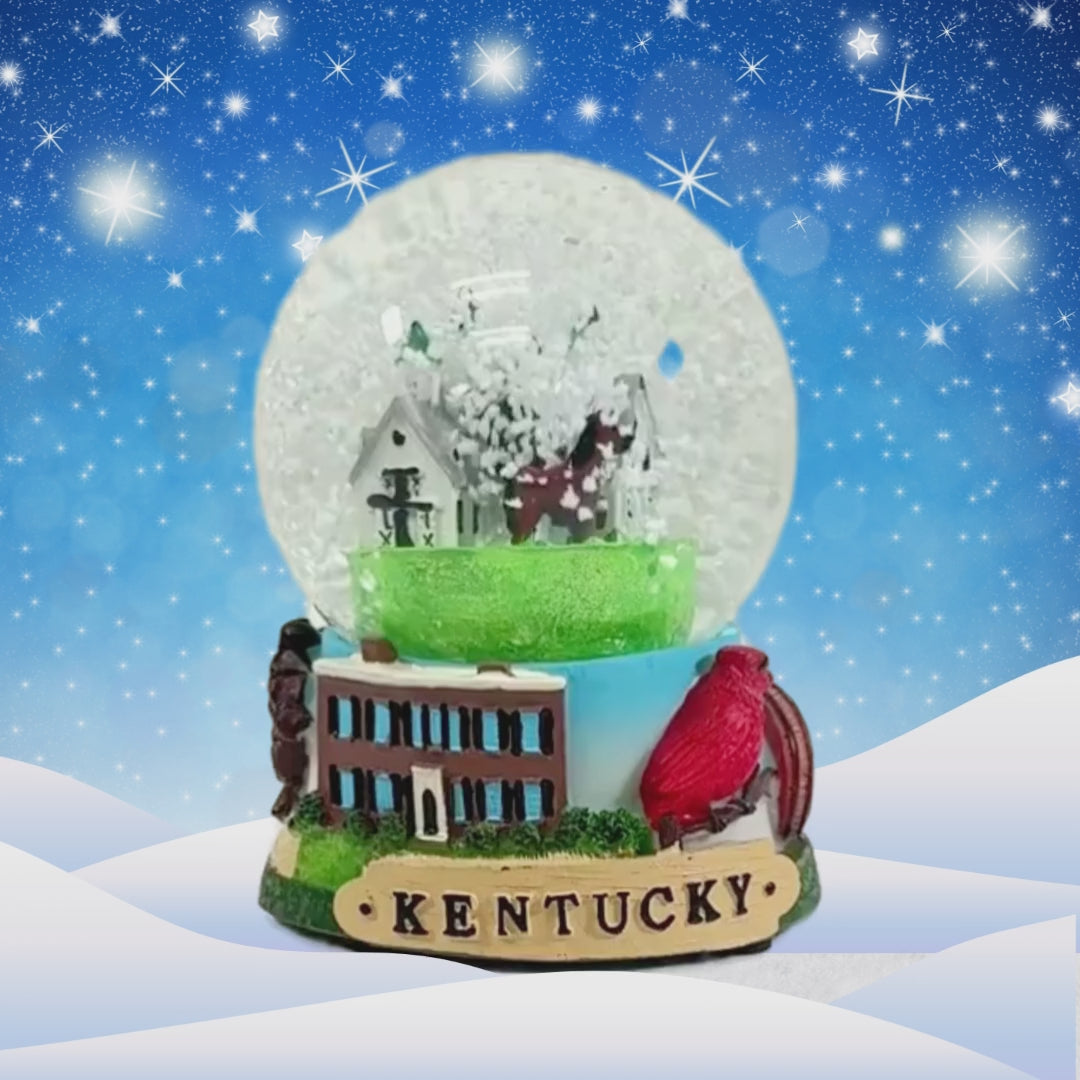 The Kentucky Snow Globe featuring a Churchill Downs-style barn against a white background.