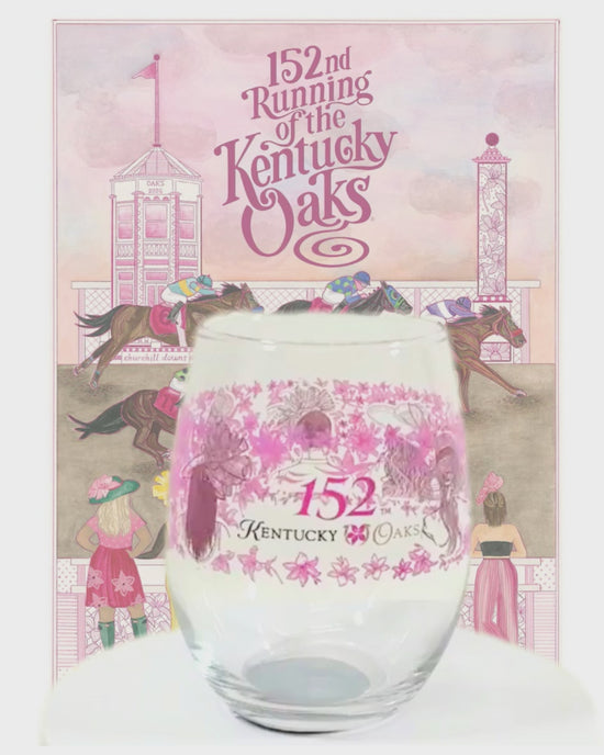 A detailed close-up showing the beautiful floral and fashion artwork on the Oaks glass.