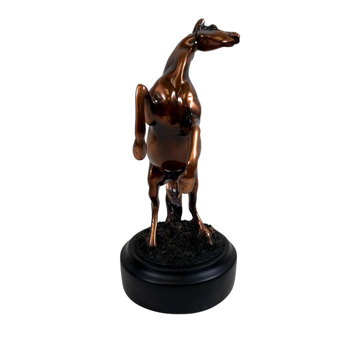 A dynamic front view of the copper-finished rearing stallion sculpture, showcasing its powerful pose and detailed craftsmanship.
