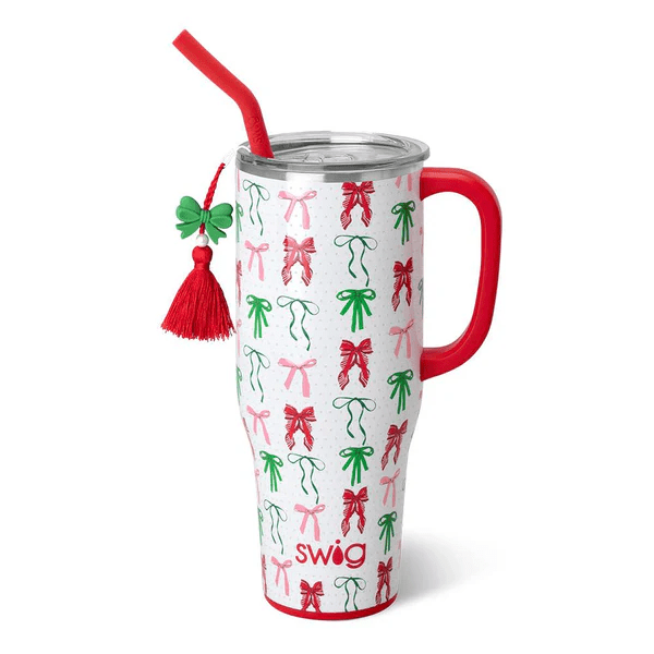 Swig 40oz Mega Mug in Ribbons and Bows print with red handle, straw, and a matching bow charm.