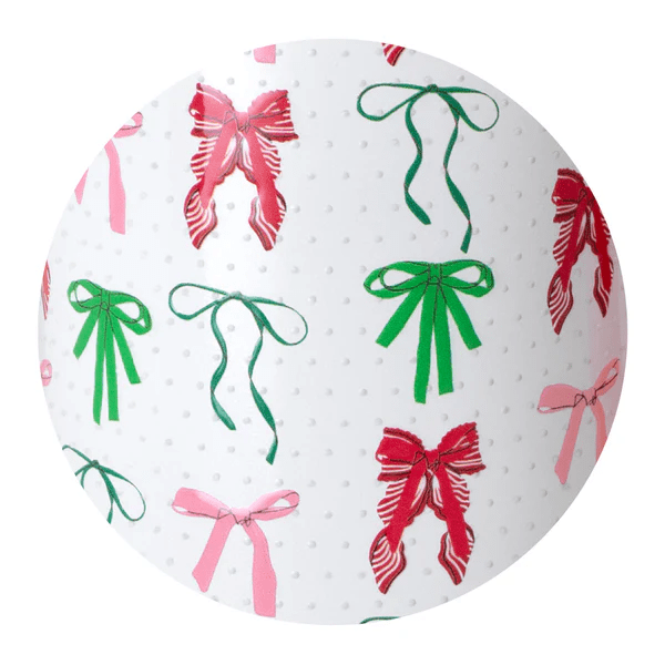 Close-up of the Ribbons and Bows pattern with red, green, and pink bows on a white background.