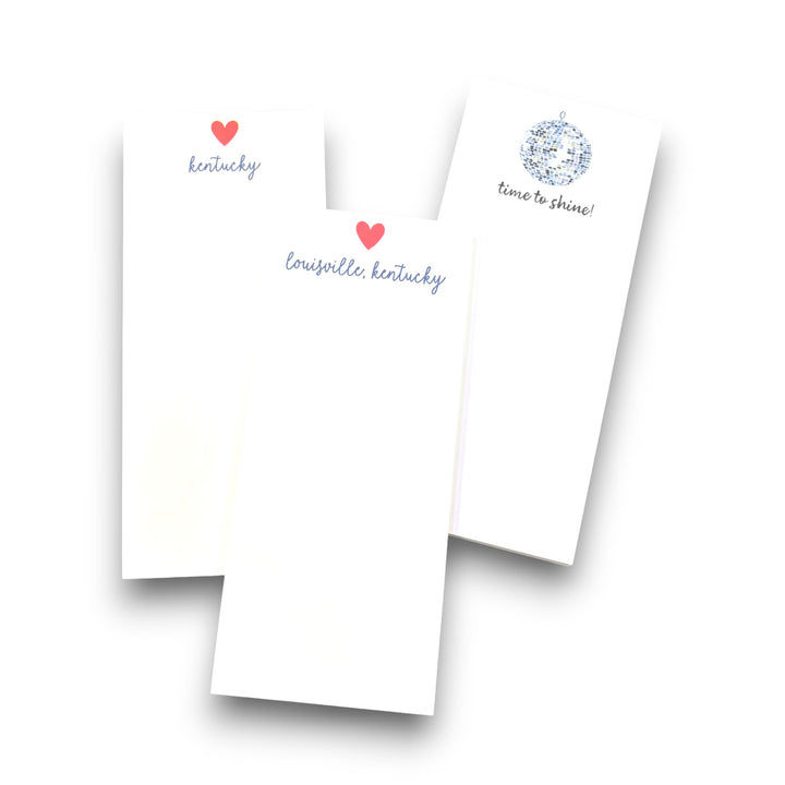 Three notepads with text and graphics on a white background