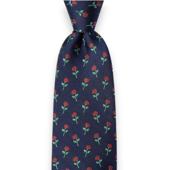 Navy blue tie with red floral pattern on a white background