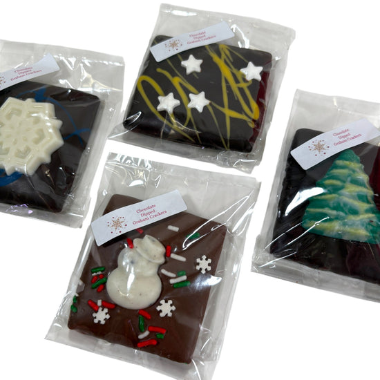 A detailed close-up shot of the different holiday designs, including a snowman and a Christmas tree.