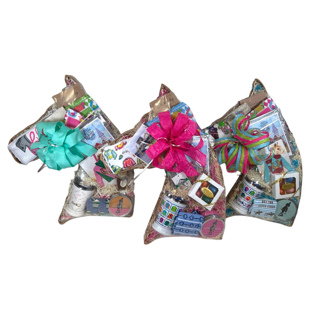  Top-down view of the gift basket contents including De'Marie cocktail mixes, Mint Julep Swig, and Arthur Court frame.