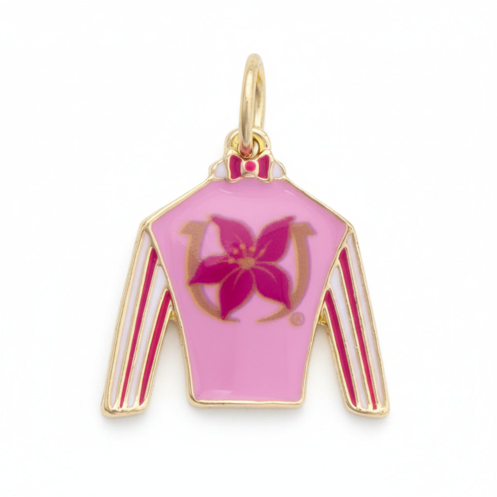 Front view of the standalone Stargazer Enamel Jockey Silk Charm in glossy pink with gold-tone accents.