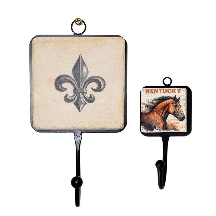 Two wall hooks with a fleur-de-lis design and a horse illustration on a white background.
