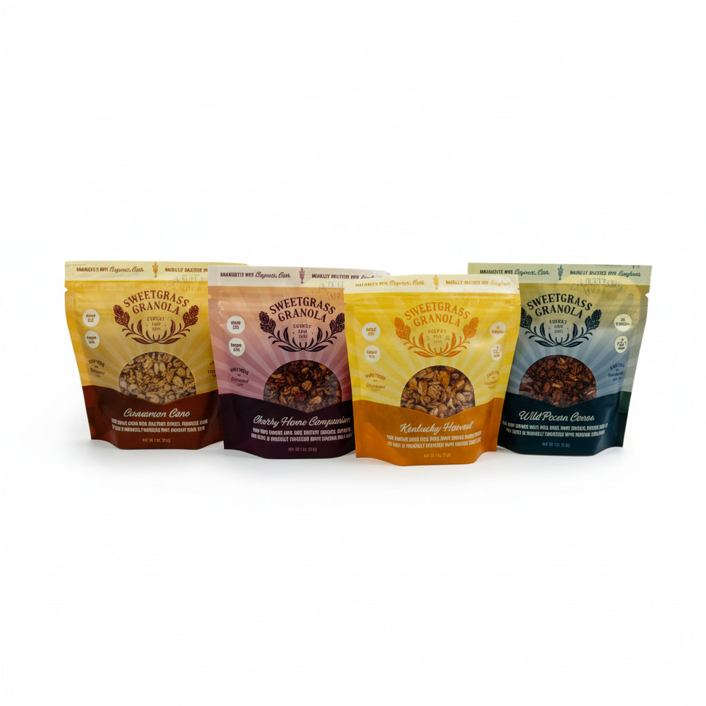 A display of all four Sweetgrass Granola 3oz snack packs arranged together.