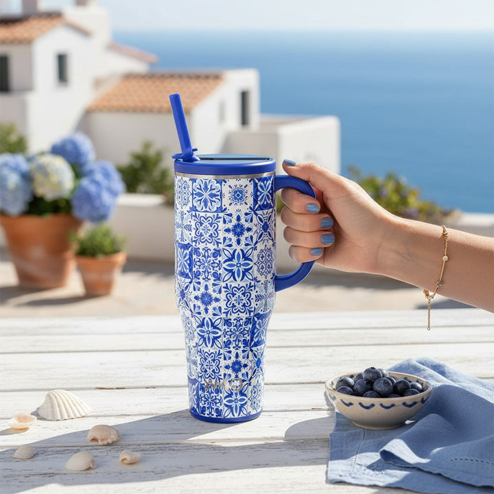 Swig Life Indigo Tiles Mega Mug styled in a bright coastal setting with European summer-inspired blue and white accents.