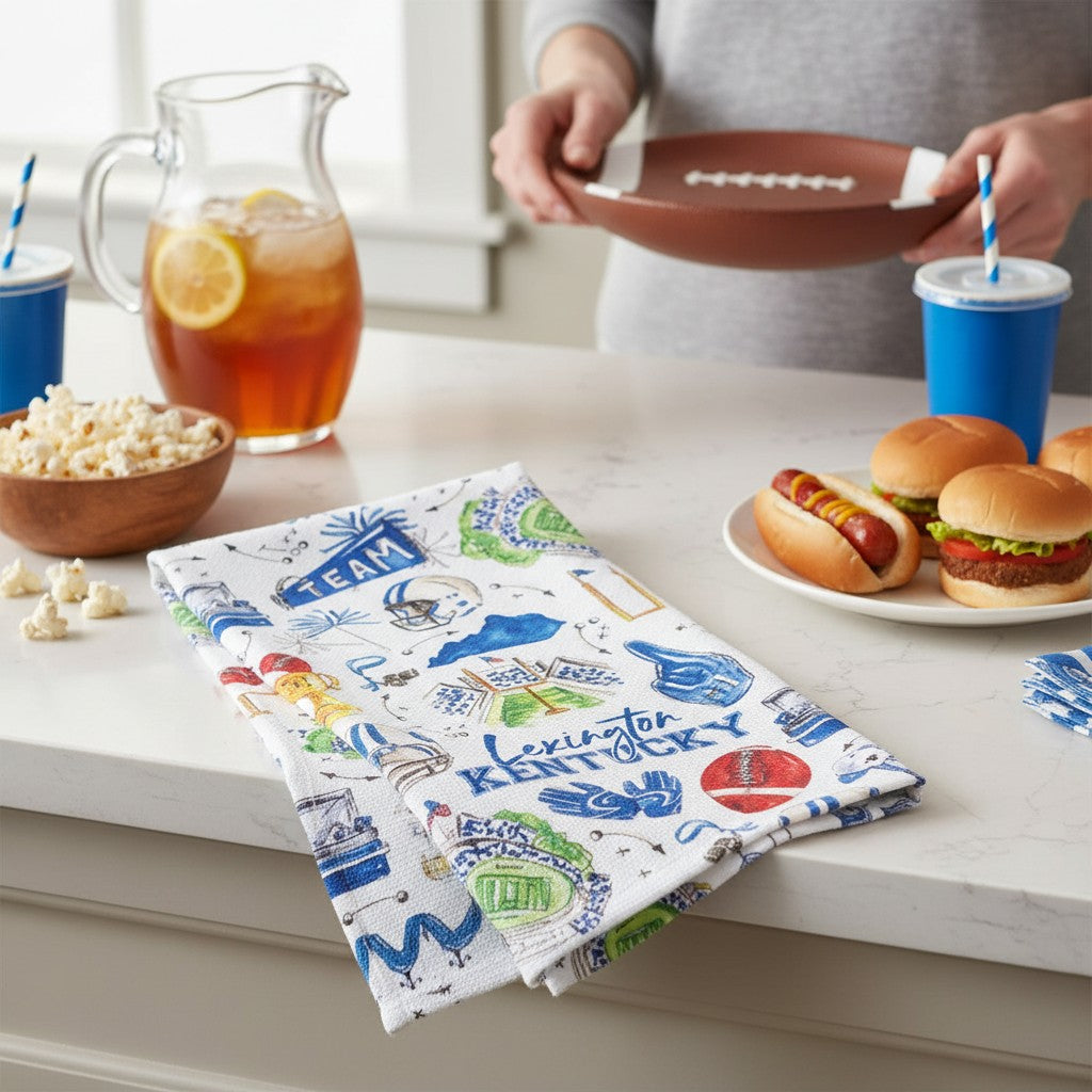 Tailgates in Lexington Tea Towel styled on a countertop during game-day prep.