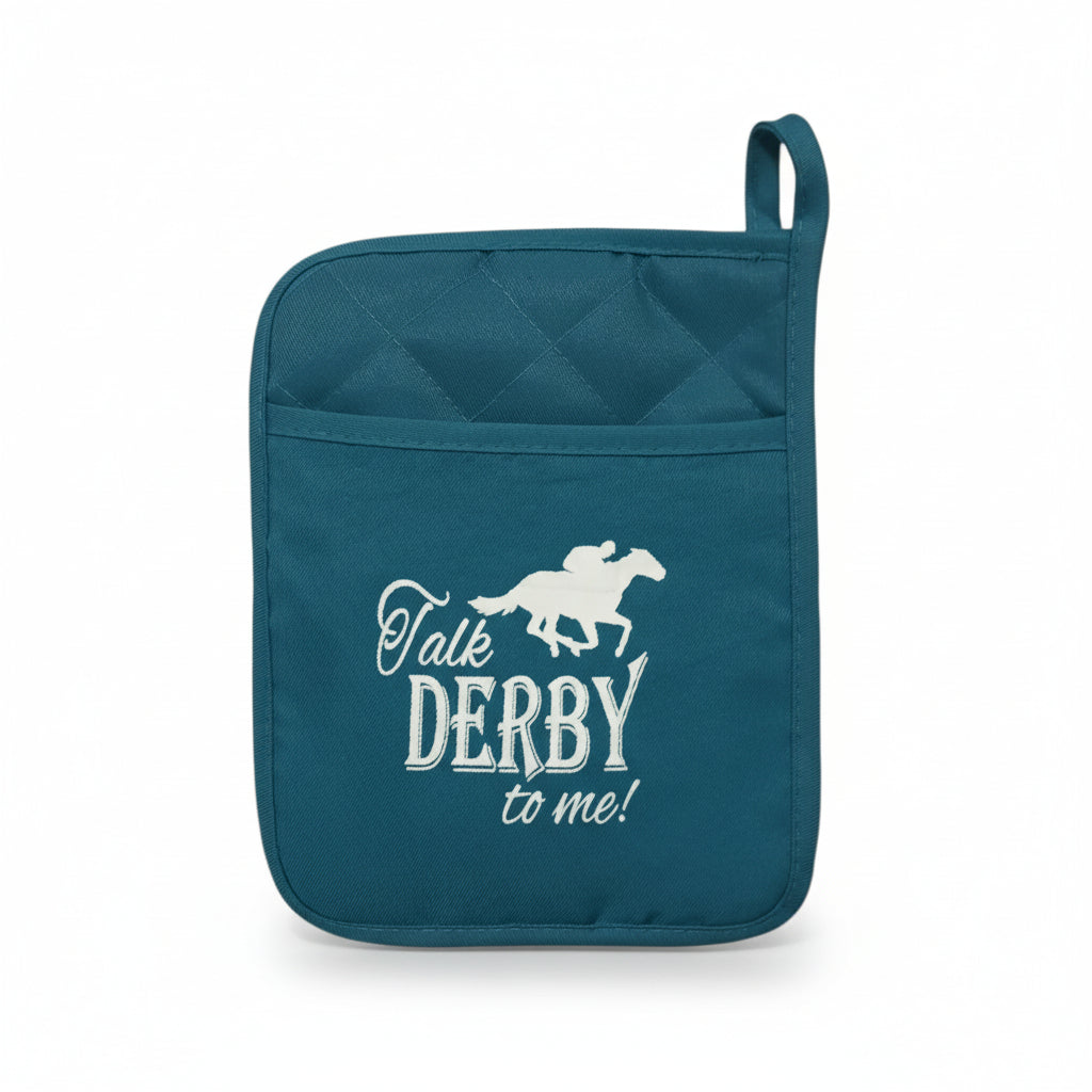 Close-up of a teal pot holder with white embroidery reading "Talk DERBY to me!" below a galloping racehorse silhouette.