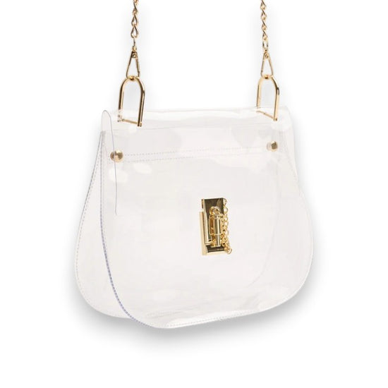 A clear plastic crossbody bag with a curved saddle shape and an elegant gold turn-lock closure on a white surface.