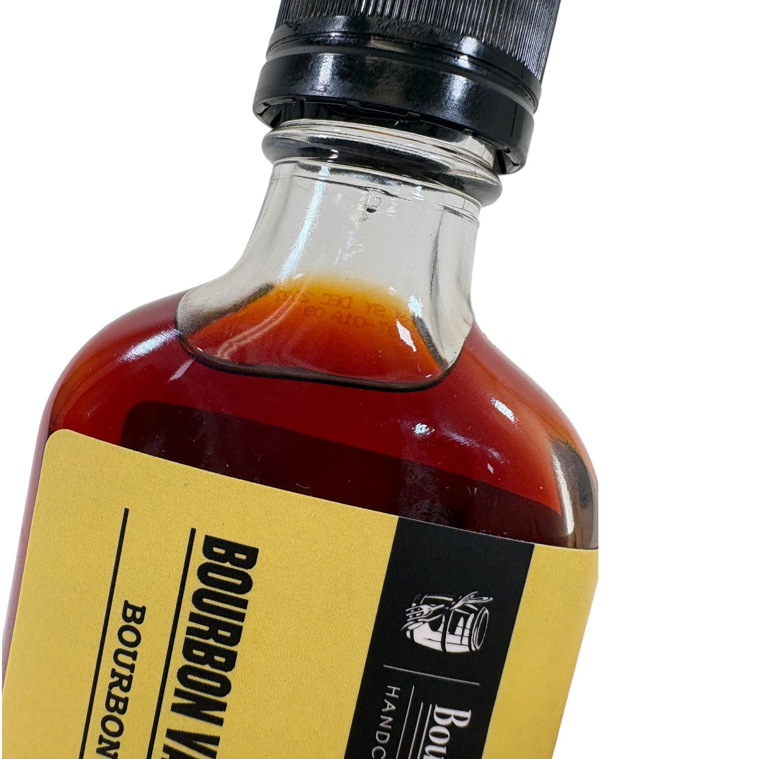 Bottle of Bourbon Vanilla Extract with a yellow label on a white background