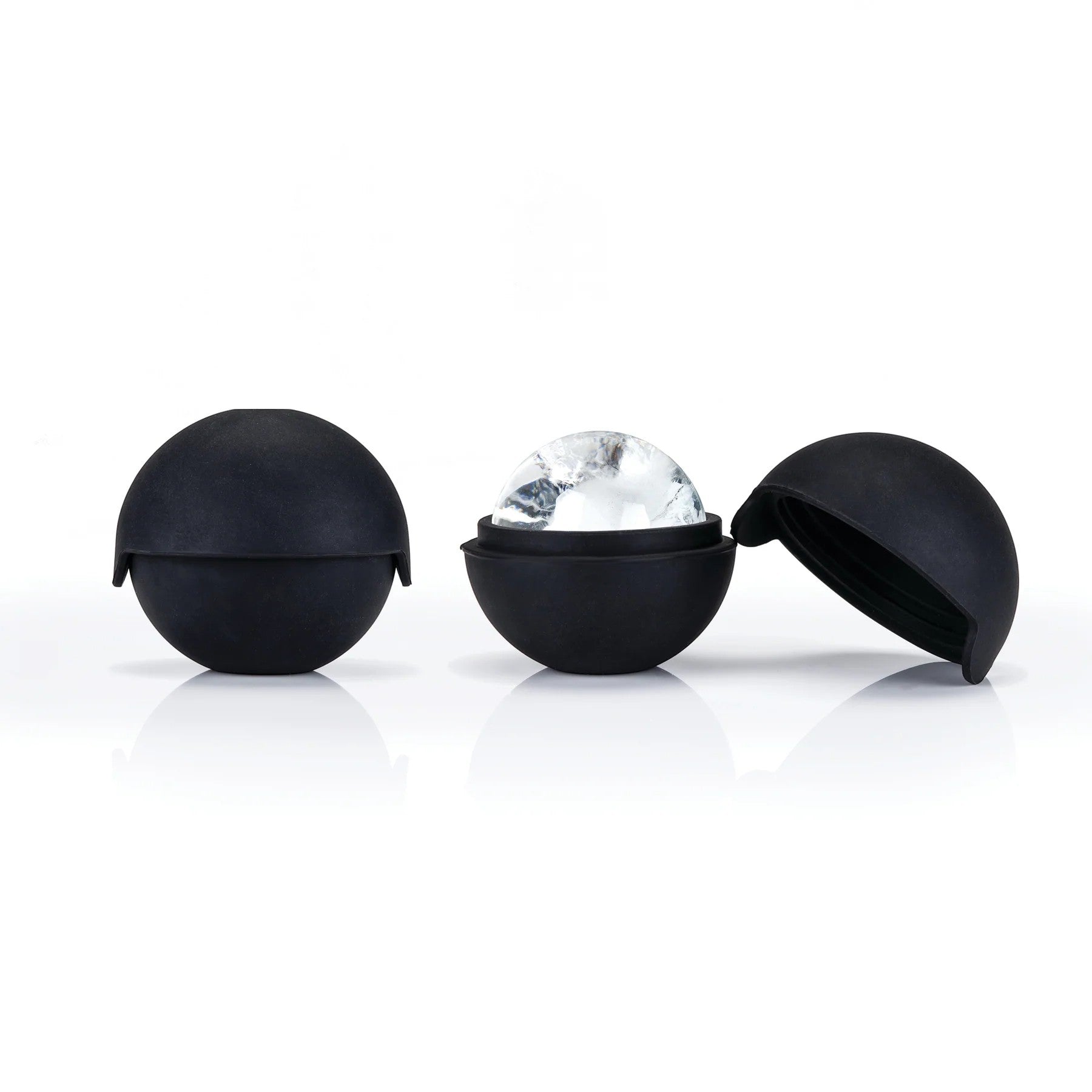 A set of two sleek, black Viski Glacier Rocks Ice Sphere Molds.