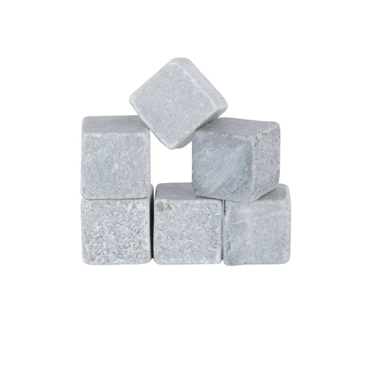 A set of six gray Viski Glacier Rocks soapstone cubes arranged neatly.
