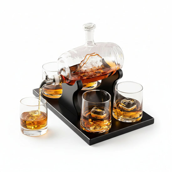 The complete whiskey decanter barrel gift set, including the decanter with internal ship, four glasses, and a mahogany wooden tray.