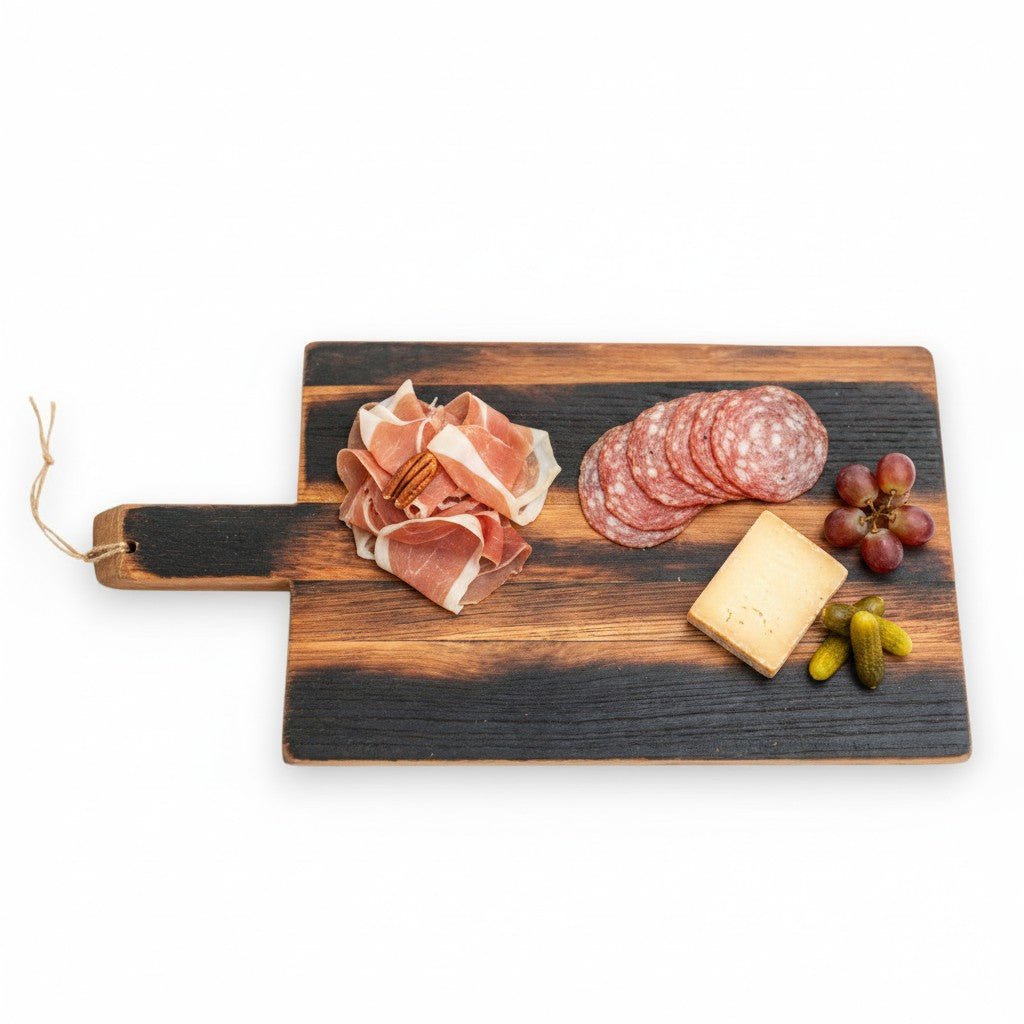 Whiskey Stave Charcuterie Board styled with cheese, crostini, nuts, and fresh rosemary for a rustic spread.