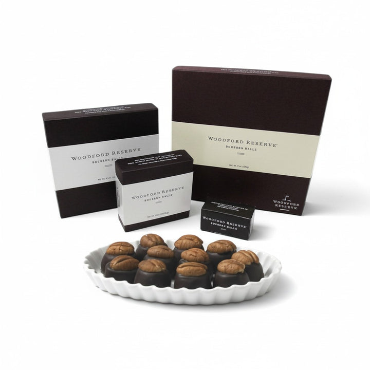 Woodford Reserve Bourbon Balls with packaging on a white background