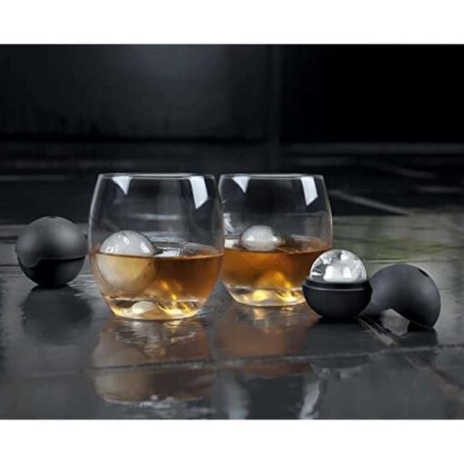 Glacier Rocks Ice Sphere Molds, pictured with made ice and glasses