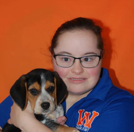 Wigglewow employee Danielle with her baby dog Bella.