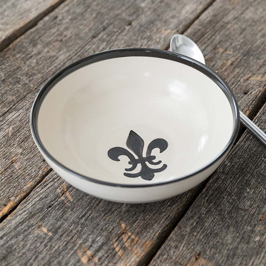 White Stoneware 9" Serving Bowl with Black hand-painted Fleur de Lis symbol on wooden table