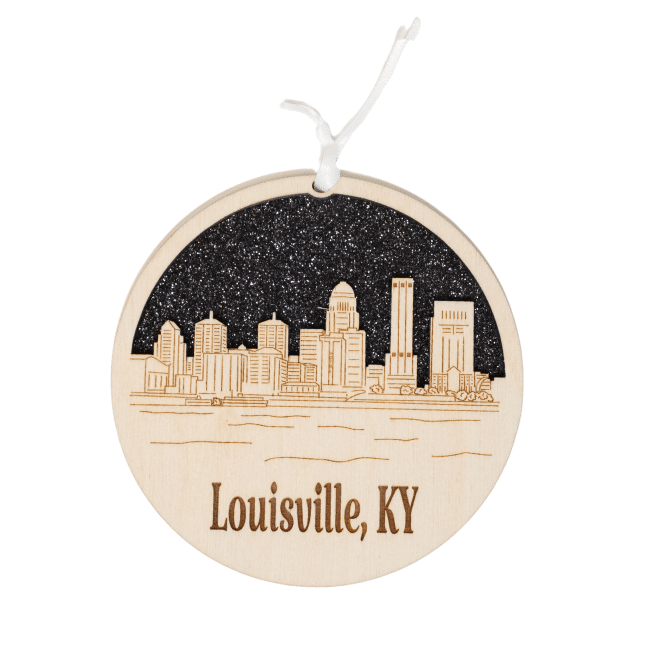 wooden ornament on a white background with the louisville ky skyline engraved